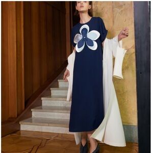 Chic Navy Blue Midi Dress with Floral Accent